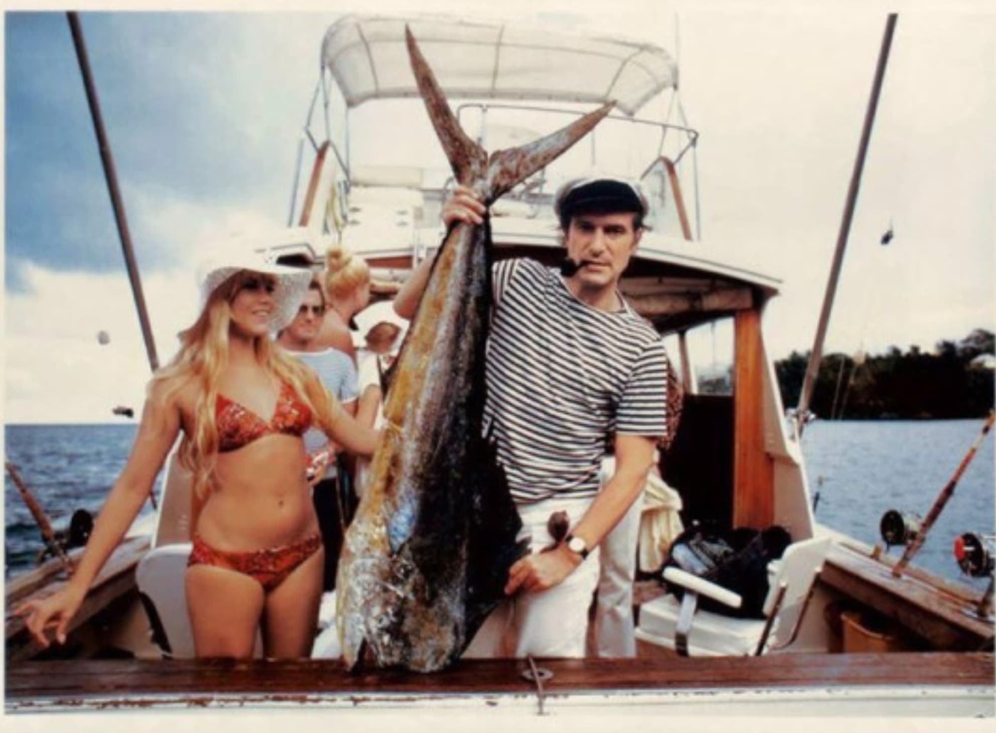 “Hugh Hefner and then girlfriend Barbi Benton fishing in Miami, 1970.”